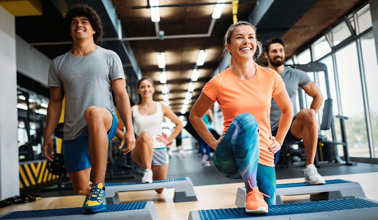 people smiling while working out