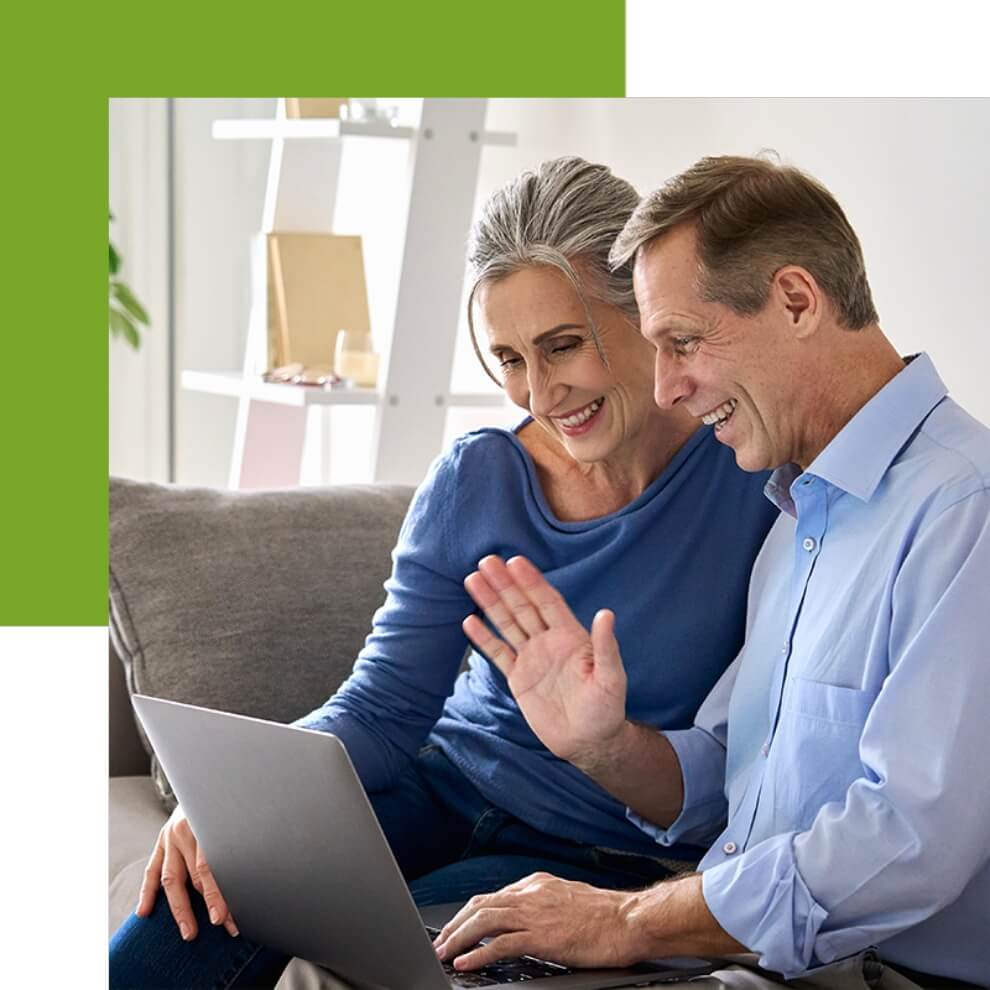 Senior Couple Using Laptop